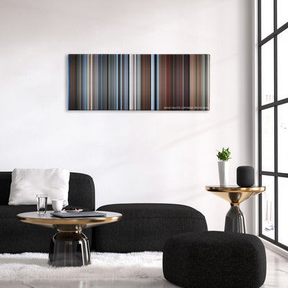 About Schmidt color palette canvas above a black sofa with a gold-topped table
