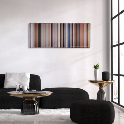 Waterworld color palette canvas above a black sofa with a gold-topped table