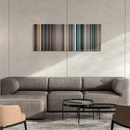 Star Trek color palette canvas on a concrete wall above a gray sectional sofa
