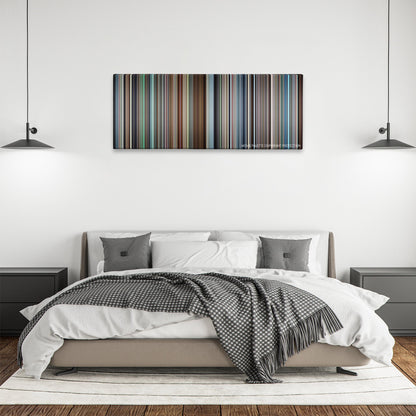 Vice color palette canvas above a bed, between two black pendant lamps