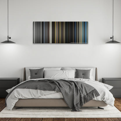The Giver color palette canvas above a bed, between two black pendant lamps