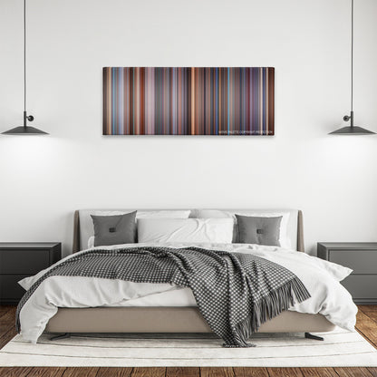 Hollow Man color palette canvas above a bed, between two black pendant lamps