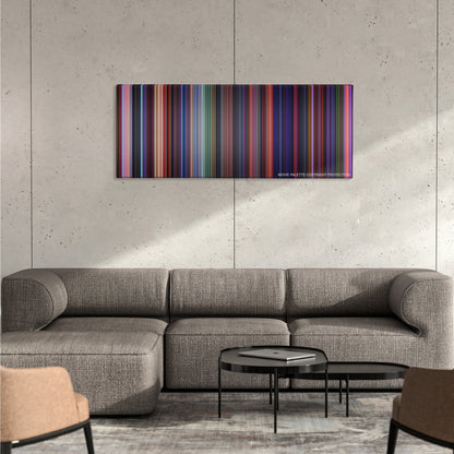 Hercules color palette canvas on a concrete wall above a gray sectional sofa