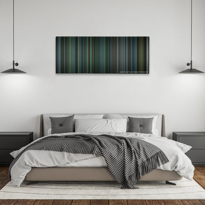 Snatch color palette canvas above a bed, between two black pendant lamps
