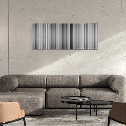 All About Eve color palette canvas on a concrete wall above a gray sectional sofa