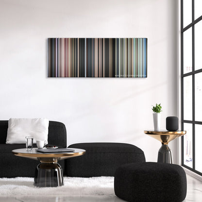 Papillon color palette canvas above a black sofa with a gold-topped table