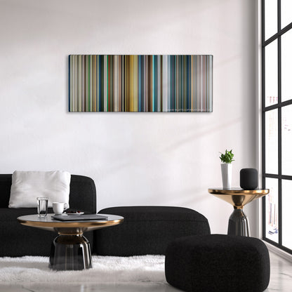 War Dogs color palette canvas above a black sofa with a gold-topped table