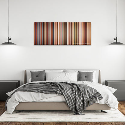 Love, Rosie color palette canvas above a bed, between two black pendant lamps