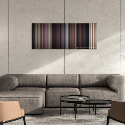 From Russia with Love color palette canvas on a concrete wall above a gray sectional sofa