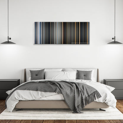 The Thing color palette canvas above a bed, between two black pendant lamps