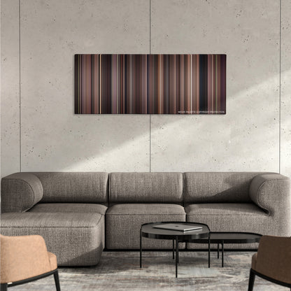 High Fidelity color palette canvas on a concrete wall above a gray sectional sofa