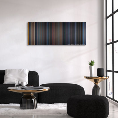 Godzilla color palette canvas above a black sofa with a gold-topped table