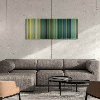13 Hours color palette canvas on a concrete wall above a gray sectional sofa