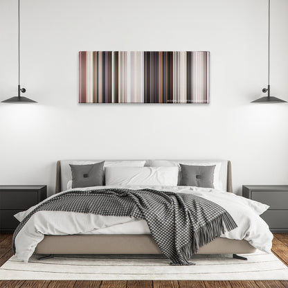 Rambo III color palette canvas above a bed, between two black pendant lamps