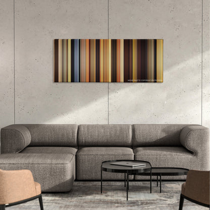 Blended color palette canvas on a concrete wall above a gray sectional sofa