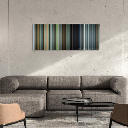 The Walk color palette canvas on a concrete wall above a gray sectional sofa