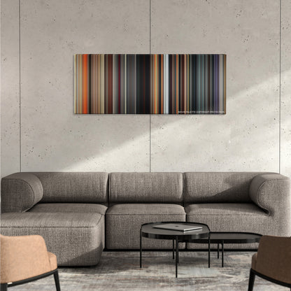 Divergent color palette canvas on a concrete wall above a gray sectional sofa