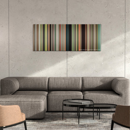 Safety Not Guaranteed color palette canvas on a concrete wall above a gray sectional sofa