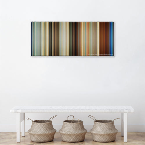 Mamma Mia! color palette canvas above a white bench with three woven baskets
