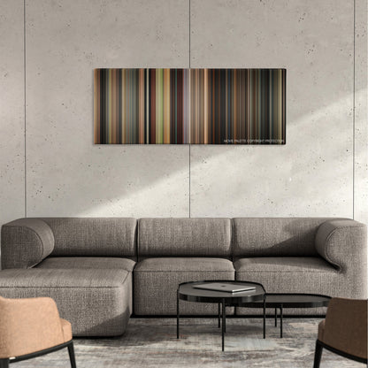 Hall Pass color palette canvas on a concrete wall above a gray sectional sofa
