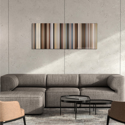 Ford v Ferrari color palette canvas on a concrete wall above a gray sectional sofa
