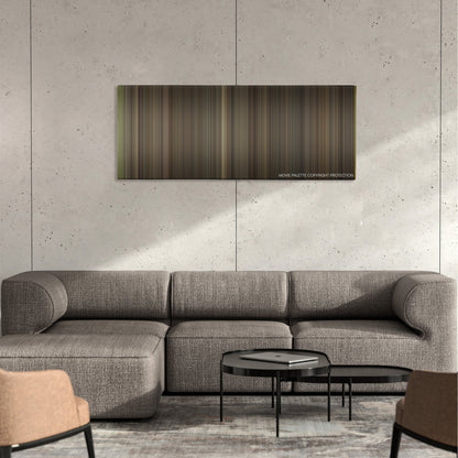 Carnage color palette canvas on a concrete wall above a gray sectional sofa