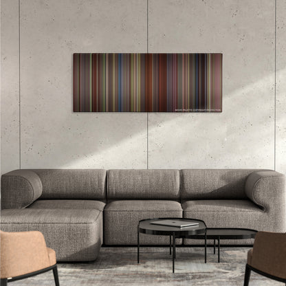 Sense and Sensibility color palette canvas on a concrete wall above a gray sectional sofa