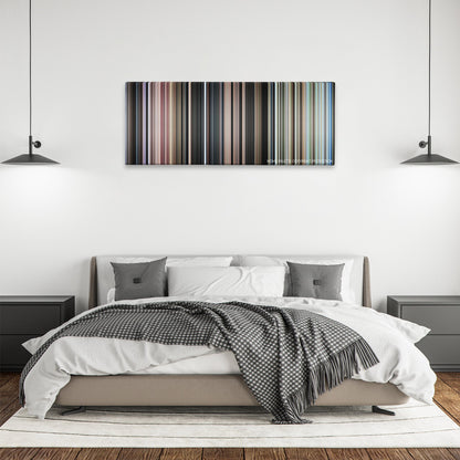 Papillon color palette canvas above a bed, between two black pendant lamps