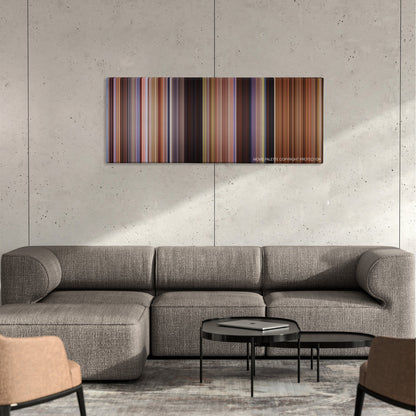 Shanghai Noon color palette canvas on a concrete wall above a gray sectional sofa
