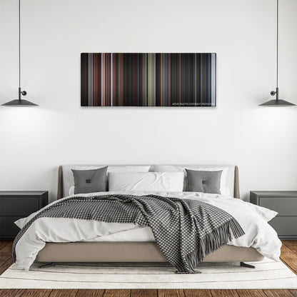 The Score color palette canvas above a bed, between two black pendant lamps