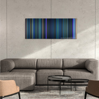 The Abyss color palette canvas on a concrete wall above a gray sectional sofa
