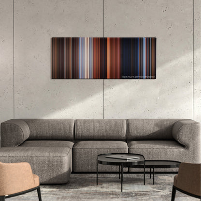 The Time Machine color palette canvas on a concrete wall above a gray sectional sofa