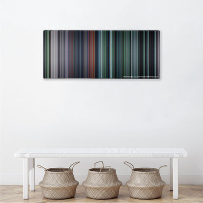 The Hunger Games color palette canvas above a white bench with three woven baskets