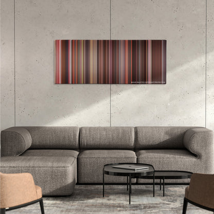 Legally Blonde color palette canvas on a concrete wall above a gray sectional sofa