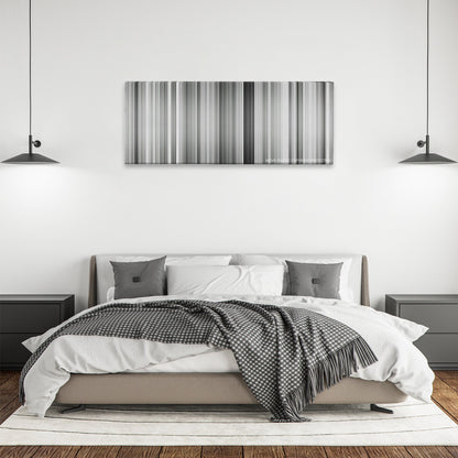 All About Eve color palette canvas above a bed, between two black pendant lamps