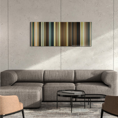 Casino Royale color palette canvas on a concrete wall above a gray sectional sofa