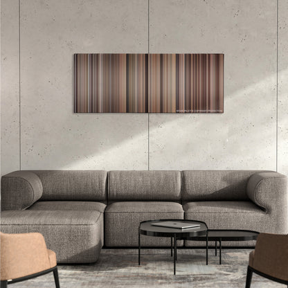 Mrs. Doubtfire color palette canvas on a concrete wall above a gray sectional sofa