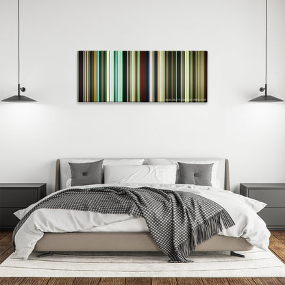 Bronson color palette canvas above a bed, between two black pendant lamps