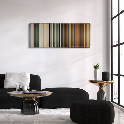 Wild Tales color palette canvas above a black sofa with a gold-topped table