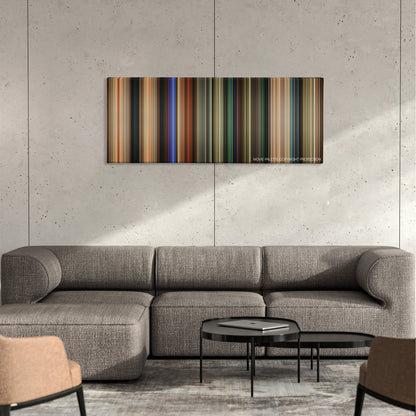 Happy Death Day color palette canvas on a concrete wall above a gray sectional sofa