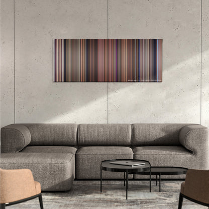Snow White and the Seven Dwarfs color palette canvas on a concrete wall above a gray sectional sofa
