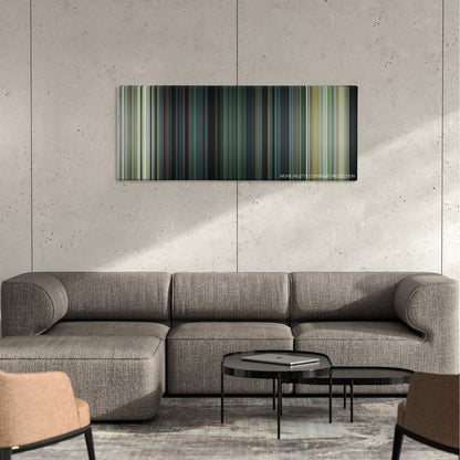 Margin Call color palette canvas on a concrete wall above a gray sectional sofa