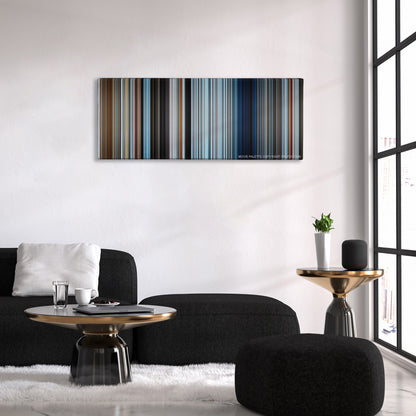 Everest color palette canvas above a black sofa with a gold-topped table
