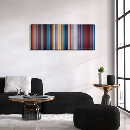 Mulan color palette canvas above a black sofa with a gold-topped table