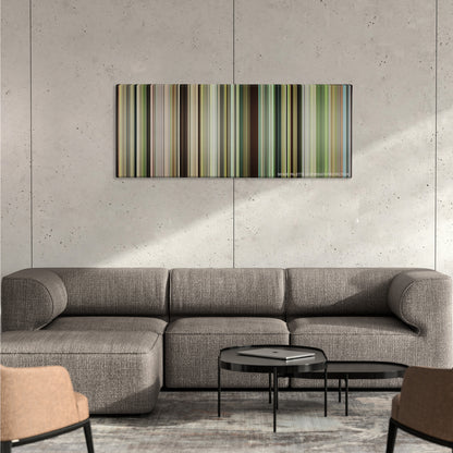 Blood Diamond color palette canvas on a concrete wall above a gray sectional sofa