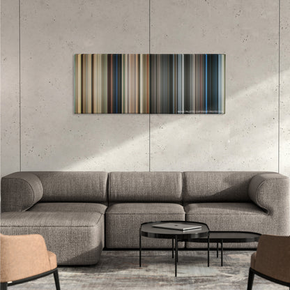 Life Is Beautiful color palette canvas on a concrete wall above a gray sectional sofa