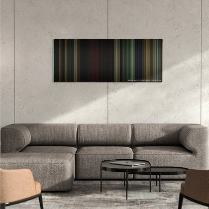 The Last of the Mohicans color palette canvas on a concrete wall above a gray sectional sofa