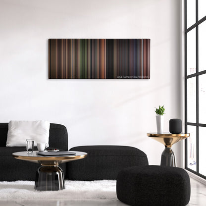 Stalker color palette canvas above a black sofa with a gold-topped table