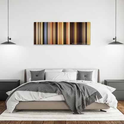 Blended color palette canvas above a bed, between two black pendant lamps