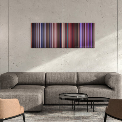 Miss Congeniality color palette canvas on a concrete wall above a gray sectional sofa